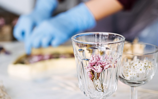 Side hustle, Money-Making Crafts, DIY Crafts To Create and Make Money. Epoxy Resin Art. Creating Art with Resin on workshop. The art process of creating epoxy resin handmade staff in art studio
